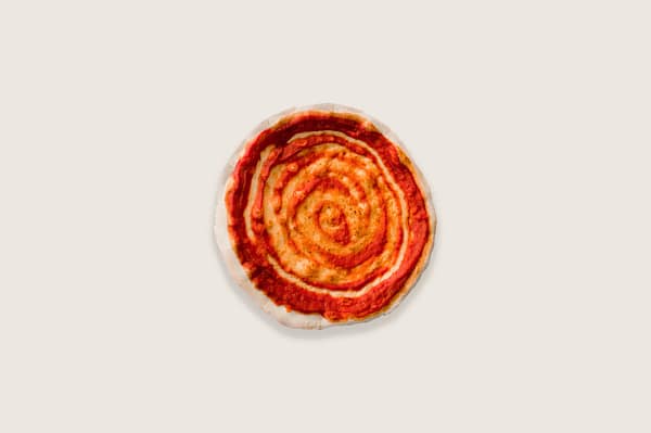 product image of frozen pizza base with tomato pizza sauce
